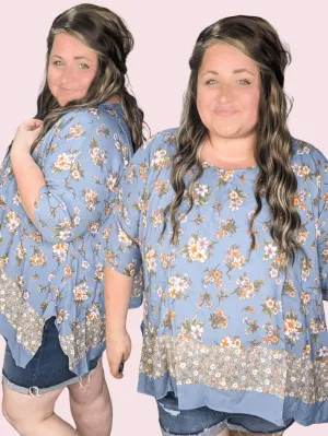 SALE- Constantine Sharkbite Hem Short Sleeve Top in Dusty Blue Florals