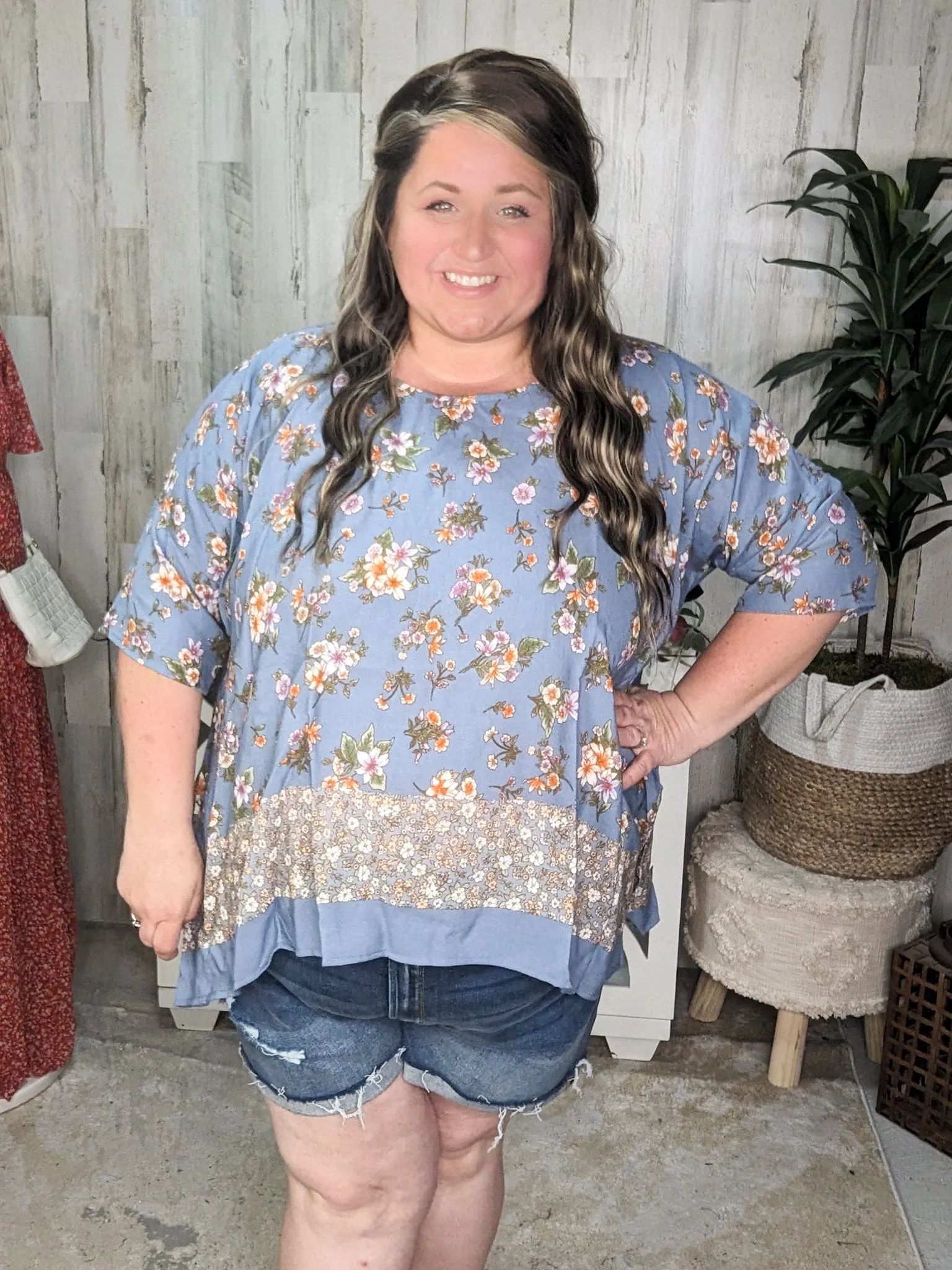 SALE- Constantine Sharkbite Hem Short Sleeve Top in Dusty Blue Florals