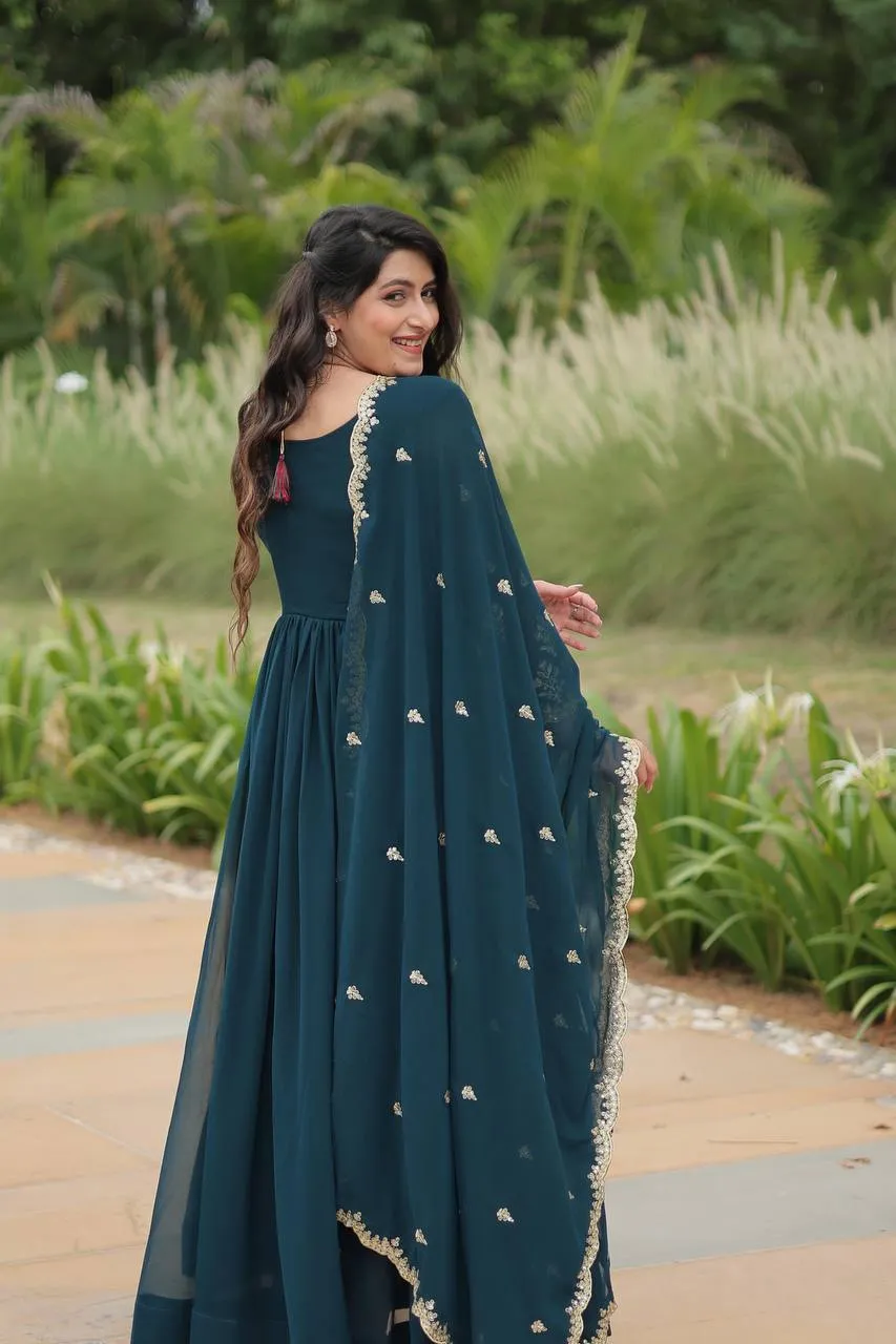 Stunning Faux Georgette Embroidered Rama Traditional Gown